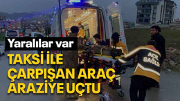 Taksi ile çarpışan araç araziye uçtu